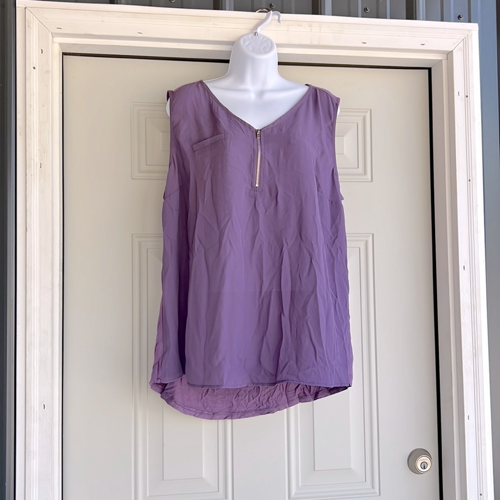 Lovely purple sleeveless blouse.